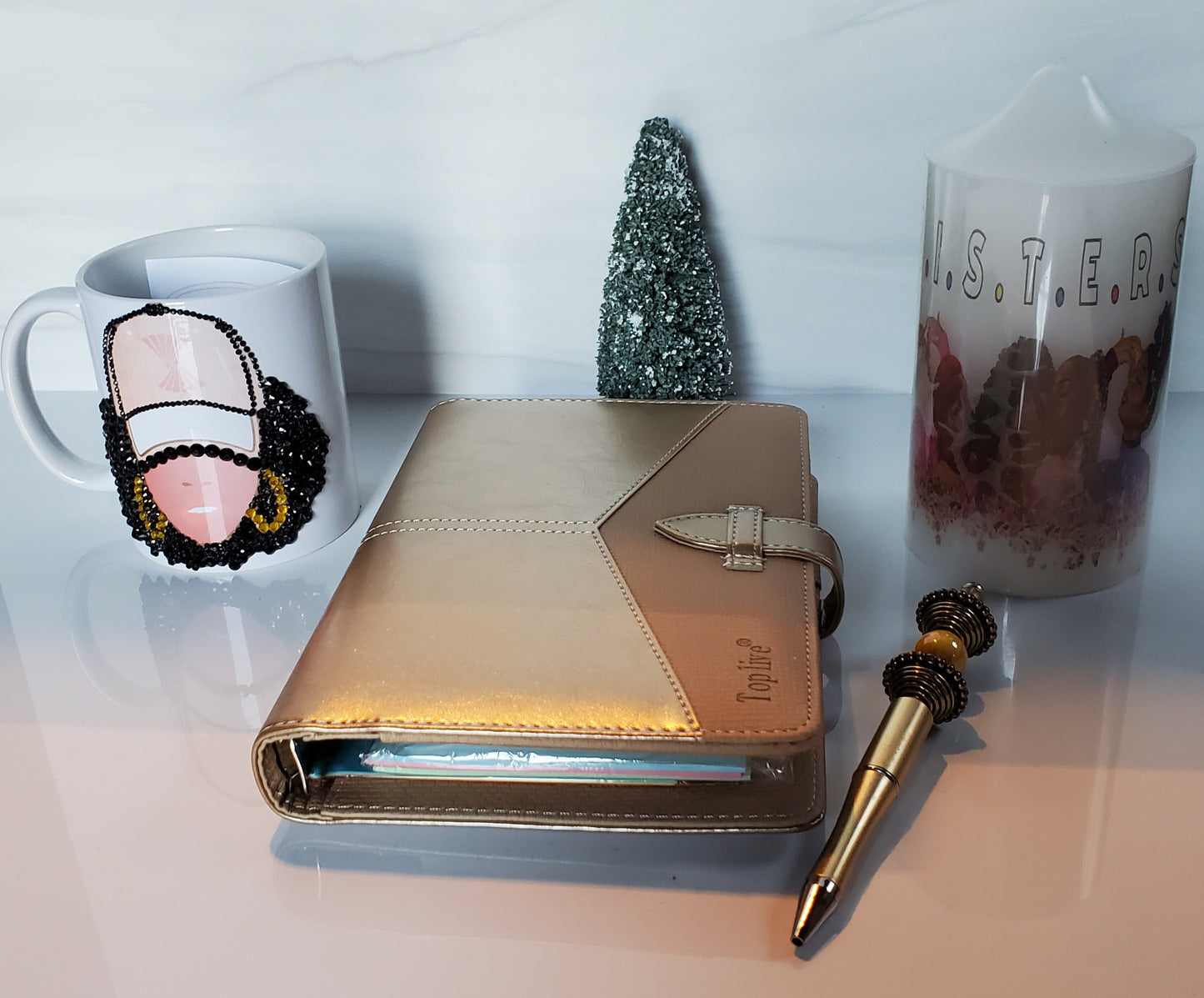 Gold 2023 Planner Cover includes annual filler pages, coordinating candle, mug and writing pen.