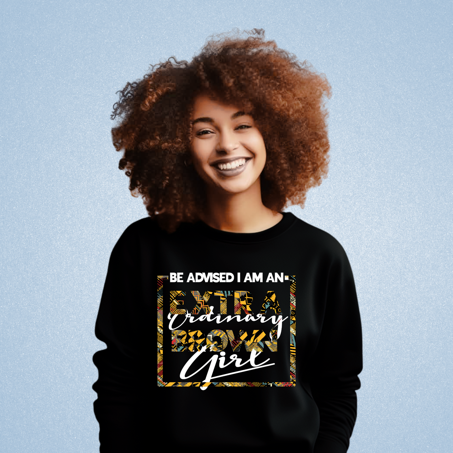 Person wearing a black long sleeved shirt with colorful text