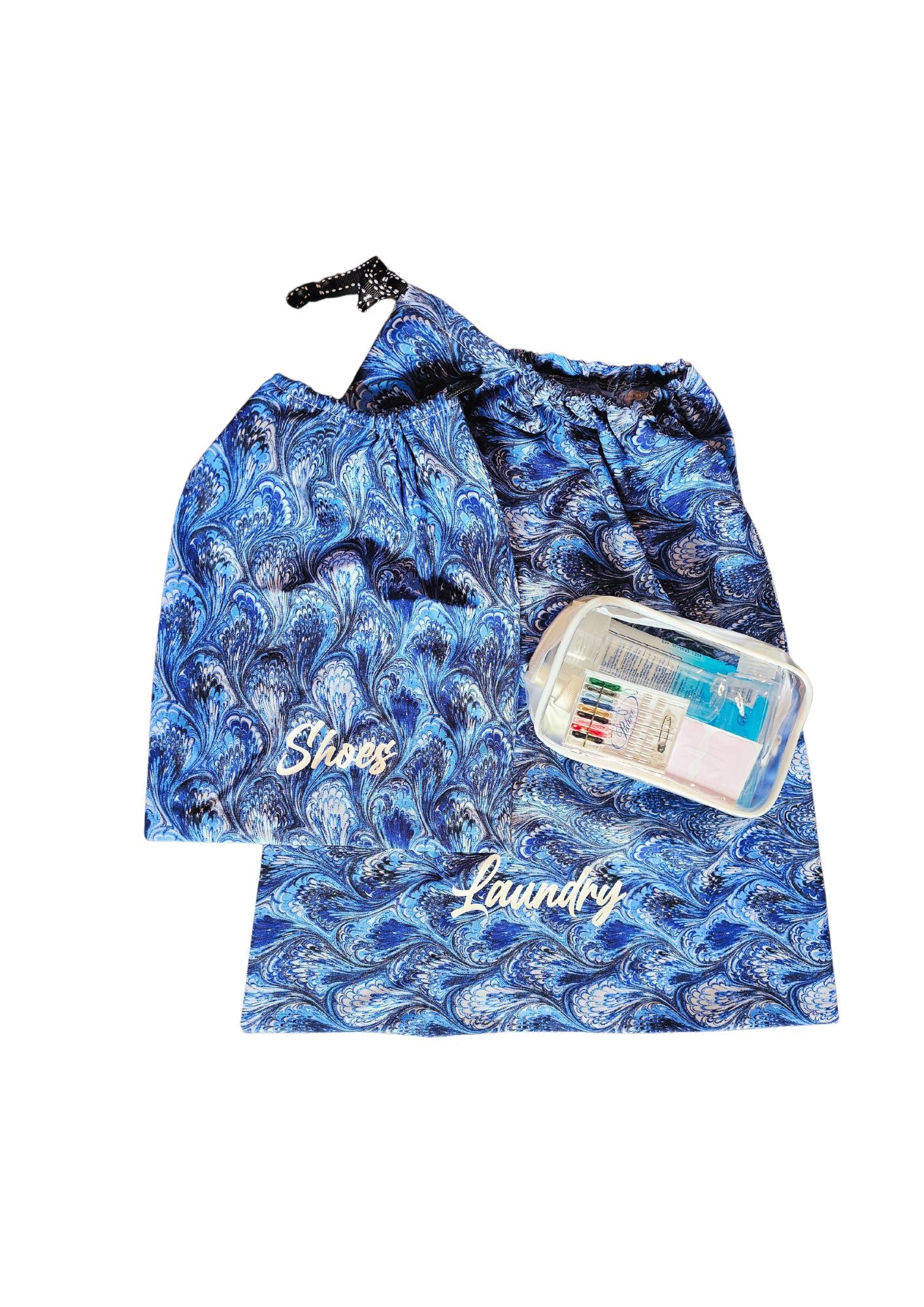 Travel Set includes travel sized bottles, hand wipes, sewing kit, laundry bag shoe bag and carrying case.